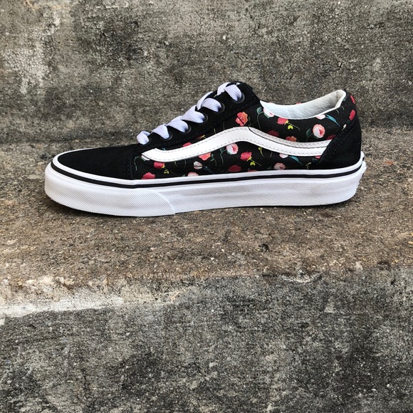 black vans with flowers on the side